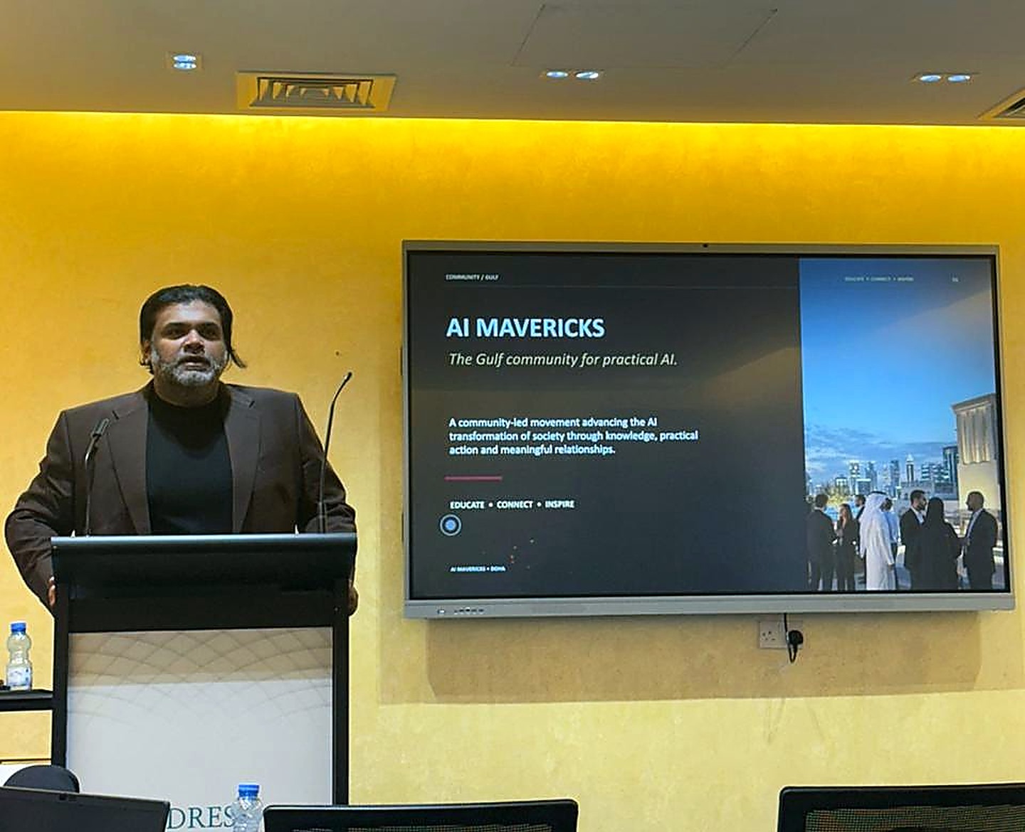 Speaker at the 2 September 2026 AI Mavericks Community Meetup, beside the AI Mavericks presentation